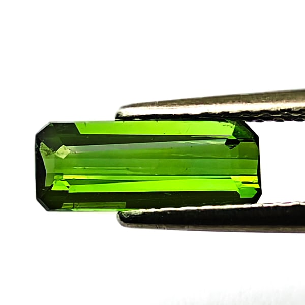 Natural Green Tourmaline 0.86 Ct. Octagon Shape 9.7 x 3.9 Mm Gemstone From Nigeria: Product ID: 807250235 Product Name: Natural Tourmaline Weight: 0.83 CT. Size: 9.7 x 3.9 x 2.4 MM. Shape: Octagon Color: Green Clarity:VSI Luster: Good Gems Origin: Nigeria Treatment: Unheated Crystal 