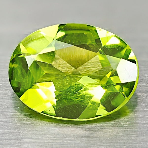Natural Green Peridot 1.14 Ct. Oval Shape Size 8 x 6 Mm. Gemstone From Pakistan: Product ID: 805316962 Product Name: Natural Peridot Weight: 1.14 CT. Size: 8 x 6 x 3.4 MM. Shape: Oval Color: Green Clarity:VSI Luster: Good Gems Origin: Pakistan Treatment: Unheated Crystal Structure