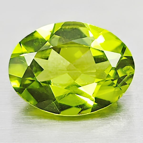 Natural Green Peridot 1.13 Ct. Oval Shape 8 x 6 Mm. Gemstone From Pakistan: Product ID: 805316963 Product Name: Natural Peridot Weight: 1.13 CT. Size: 8 x 6 x 3.4 MM. Shape: Oval Color: Green Clarity:VSI Luster: Good Gems Origin: Pakistan Treatment: Unheated Crystal Structure