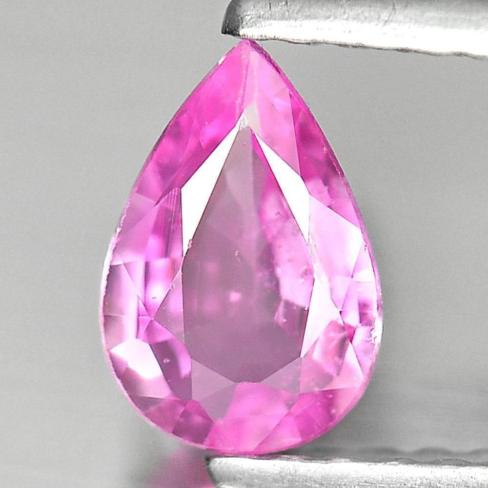 Natural Pink Sapphire 0.53 Ct. Pear Shape 6.6 x 4.5 Mm. Gemstone From Tanzania: Product ID: 806140632 Product Name: Natural Purple Sapphire Weight: 0.53 CT. Size: 6.6 x 4.5 x 2.4 MM. Shape: Pear Color: Pink Clarity:VSI Luster: Very Good Gems Origin: Tanzania Treatment: Heated Cry