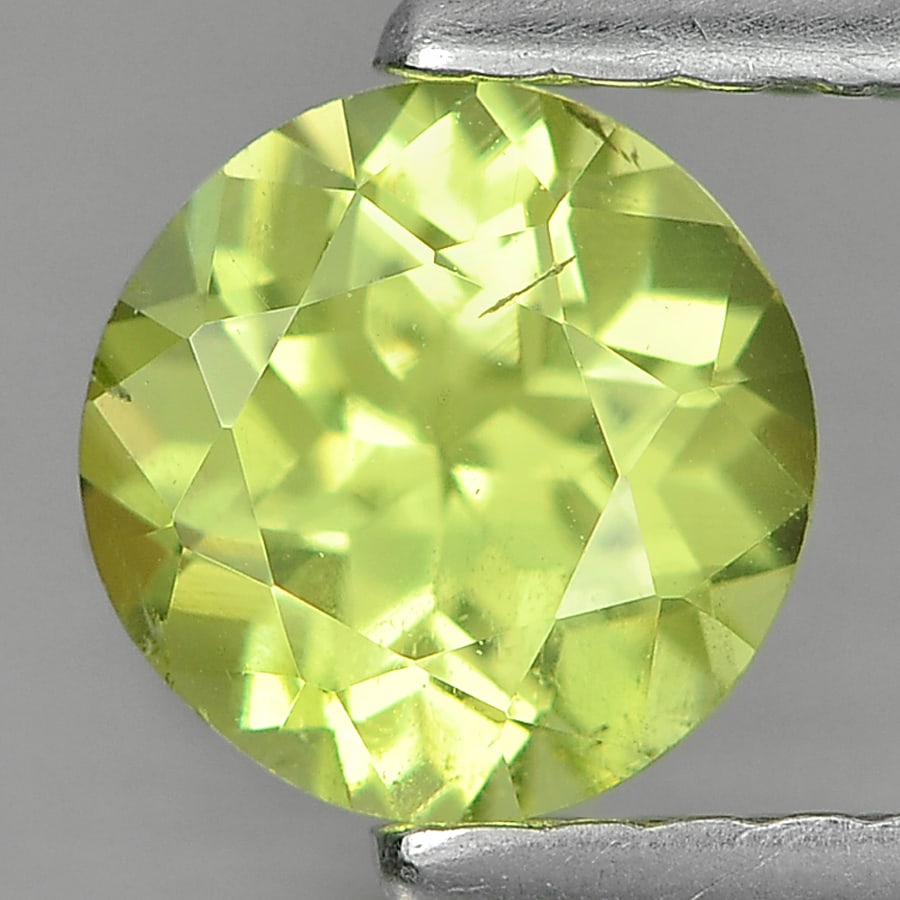 Natural Greenish Yellow Mali Garnet 0.77 Ct. Round Shape 5.5 x 3.6 Mm. Gemstone From Madagascar: Product ID: 802936151 Product Name: Natural Mali Garnet Weight: 0.77 CT. Size: 5.5 x 3.6 MM. Shape: Round Color: Yellow Clarity:SI1 Luster: Good Gems Origin: Madagascar Treatment: Unheated Crystal Str