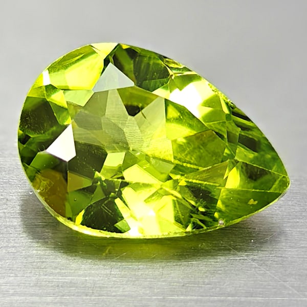 Natural Green Peridot 1.87 Ct. Pear Shape 9.9 x 6.9 Mm. Gemstone From Pakistan: Product ID: 805317009 Product Name: Natural Weight: 1.87 CT. Size: 9.9 x 6.9 x 4.2 MM. Shape: Pear Color: Green Clarity:VSI Luster: Good Gems Origin: Pakistan Treatment: Unheated Crystal Structure: Ha