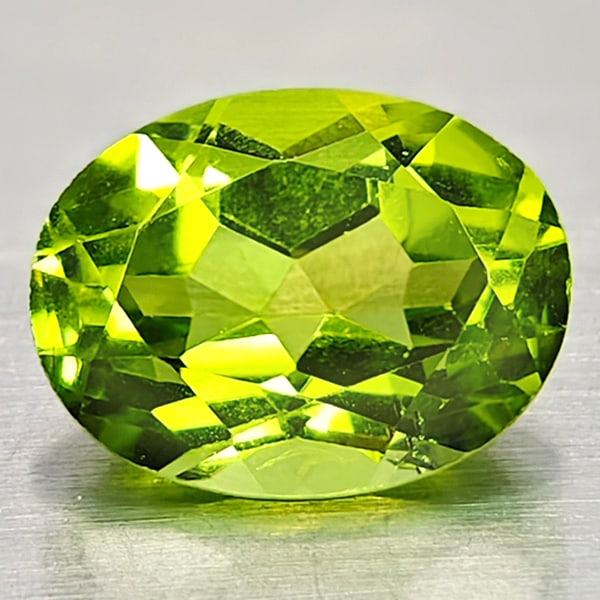 Natural Green Peridot 2.25 Ct. Oval Shape 6.8 x 9 Mm. Gemstone Unheated From Pakistan: Product ID: 805316944 Product Name: Natural Peridot Weight: 2.25 CT. Size: 6.8 x 9 x 4.9 MM. Shape: Oval Color: Green Clarity:VSI Luster: Good Gems Origin: Pakistan Treatment: Unheated Crystal Structu
