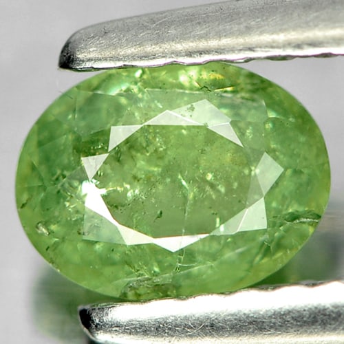 Natural Green Demantoid Garnet 0.73 Ct. Oval Shape 6.2 x 4.8 Mm. Gemstone From Madagascar: Product ID: 802919279 Product Name: Natural Demantoid Weight: 0.73 CT. Size: 6.2 x 4.8 x 2.9 MM. Shape: Oval Color: Green Clarity:SI Luster: Good Gems Origin: Madagascar , Africa Treatment: Unheated C