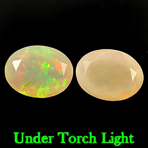 Natural Multi Color Opal 1.54 Ct. 2 Pcs. Oval Shape 8 x 6.1 Mm. Gemstone From Ethiopia: Product ID: 818725412 Product Name: Natural Opal Weight: 1.54 CT. Size: 8 x 6.1 x 4.6 MM. Shape: Oval Color: Multi-Color Clarity:Semi - Transparent Luster: Iridescent Gems Origin: Ethiopia Treatment: 