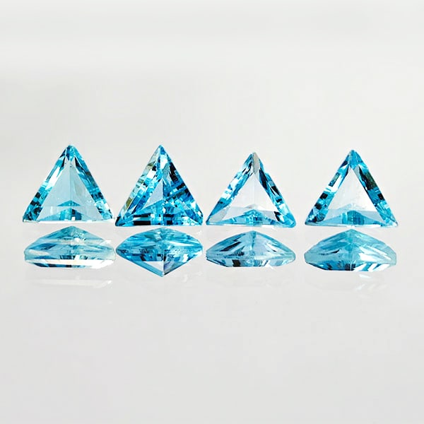 Natural Swiss Blue Topaz 2.05 Ct. 4 Pcs. Trilliant Shape 5.5 x 5.5 Mm. Gemstones From Brazil: Product ID: 807167778 Product Name: Natural Blue Topaz Weight: 2.05 CT. Size: 5.5 x 5.5 x 2.9 MM. Shape: Trilliant Color: Blue Clarity:VVS Luster: Good Gems Origin: Brazil Treatment: Treated Crystal S