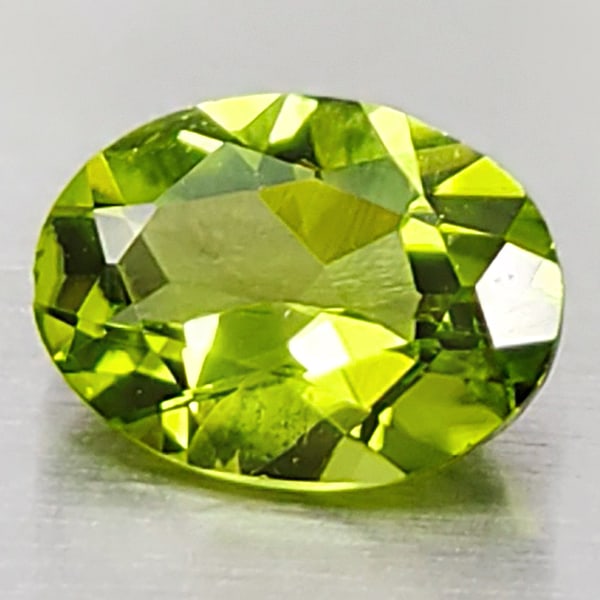 Natural Green Peridot 1.36 Ct. Oval Shape 8 x 6 Mm. Unheated Gemstone From Pakistan: Product ID: 805316979 Product Name: Natural Peridot Weight: 1.36 CT. Size: 8 x 6 x 3.8 MM. Shape: Oval Color: Green Clarity:VSI Luster: Good Gems Origin: Pakistan Treatment: Unheated Crystal Structure