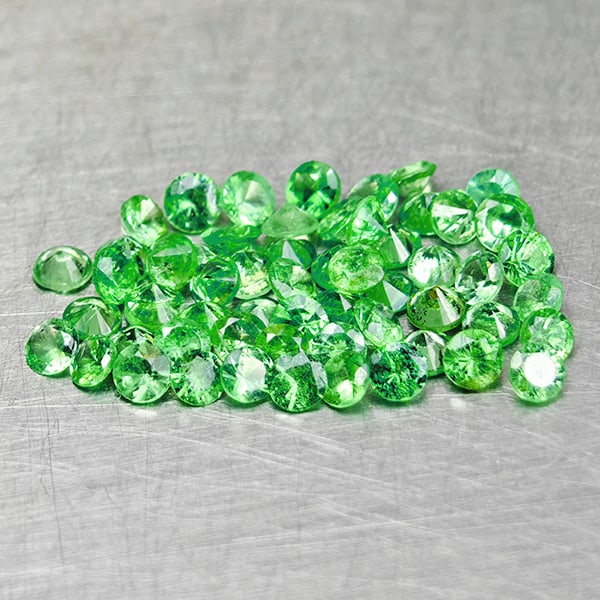 Natural Green Tsavorite Garnet 1.11 Ct. 57 Pcs Round Diamond Cut 1.6 Mm Gemstones From Tanzania: Product ID: 802936499 Product Name: Natural Tsavorite Weight: 1.11 CT. Size: 1.6 x 1.6 x 1.4 MM. Shape: Round Diamond Cut Color: Green Clarity:VSI Luster: Very Good Gems Origin: Tanzania Treatment: Un