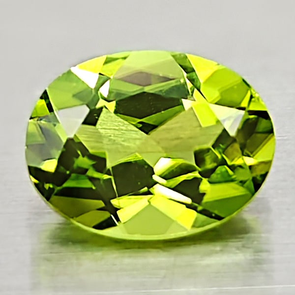 Natural Green Peridot 1.02 Ct. Oval Shape 8 x 6 Mm. Gemstone From Pakistan: Product ID: 805316972 Product Name: Natural Peridot Weight: 1.02 CT. Size: 8 x 6 x 3 MM. Shape: Oval Color: Green Clarity:VSI Luster: Good Gems Origin: Pakistan Treatment: Unheated Crystal Structure: 