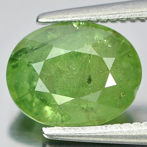 Natural Green Demantoid Garnet 2.05 Ct. Oval Shape 8.3 x 6.5 Mm. Gemstone From Madagascar: Product ID: 802919236 Product Name: Natural Demantoid Weight: 2.05 CT. Size: 8.3 x 6.5 x 4.5 MM. Shape: Oval Color: Green Clarity:SI Luster: Good Gems Origin: Madagascar , Africa Treatment: Unheated C