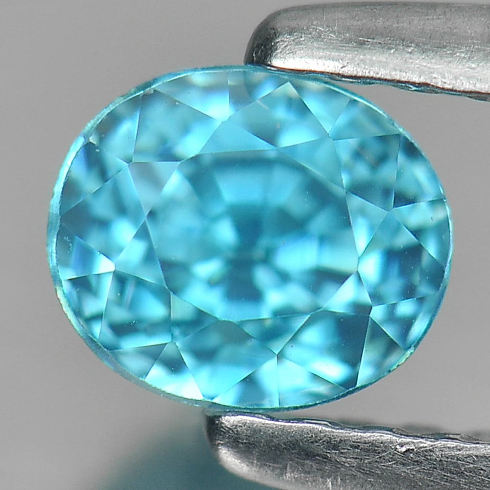 Natural Blue Zircon 0.98 Ct. Clean Oval Shape Size 5 x 4.3 Mm. Gemstone From Cambodia: Product ID: 807730769 Product Name: Natural Zircon Weight: 0.98 CT. Size: 5 x 4.3 x 4.3 MM. Shape: Oval Color: Blue Clarity:IF Luster: Good Gems Origin: Cambodia Treatment: Heated Crystal Structure: T