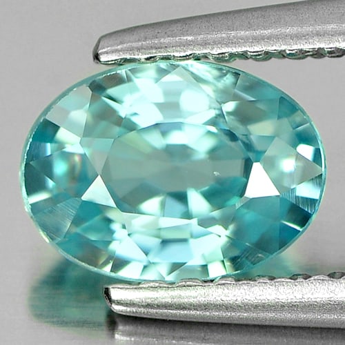 Natural Blue Zircon 1.24 Ct. Oval Shape 7 x 5.1 Mm. Gemstone From Cambodia: Product ID: 807724114 Product Name: Natural Zircon Weight: 1.24 CT. Size: 7 x 5.1 x 3.4 MM. Shape: Oval Color: Blue Clarity:SI Luster: Good Gems Origin: Cambodia Treatment: Heated Crystal Structure: T