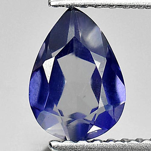 Natural Violet Blue Iolite 0.80 Ct. Pear Shape 8 x 5.7 Mm. Gemstone From Madagascar: Product ID: 803804271 Product Name: Natural Iolite Weight: 0.80 CT. Size: 8 x 5.7 x 3.4 MM. Shape: Pear Color: Violet Blue Clarity:VSI Luster: Good Gems Origin: Madagascar Treatment: Unheated Crystal