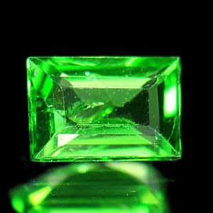 Natural Green Tsavorite Garnet 0.27 Ct. Baguette Shape 4.6 x 3.2 Mm. Gemstone From Tanzania: Product ID: 803001169 Product Name: Natural Tsavorite Weight: 0.27 CT. Size: 4.6 x 3.2 x 1.8 MM. Shape: Baguette Color: Green Clarity:SI Luster: Good Gems Origin: Tanzania Treatment: Unheated Crystal