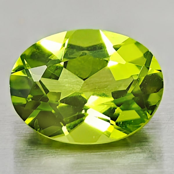 Natural Green Peridot 1.38 Ct. Oval Shape 8 x 6 Mm. Gemstone From Pakistan: Product ID: 805316966 Product Name: Natural Peridot Weight: 1.38 CT. Size: 8 x 6 x 4 MM. Shape: Oval Color: Green Clarity:VSI Luster: Good Gems Origin: Pakistan Treatment: Unheated Crystal Structure: 