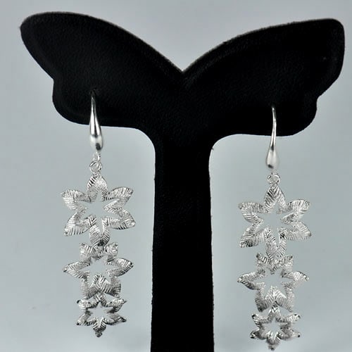 4.40 Grams Real 925 Sterling Silver Fine Jewelry Flower Hanging chandelier: Product ID: 205101076 Product Type: 925 Sterling Silver Fine Jewelry Jewelry Weight: 4.40 Grams. Gemstones Color: Silver Metal: Solid Silver 92.5%. Gemstone Detail: At Your Service: At Treasure of Gem