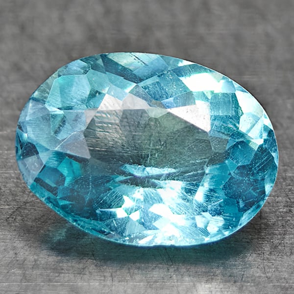 Natural Paraiba Color Neon Blue  Apatite 0.97 Ct. Oval Shape 7.5 x 5.6 Mm Gemstone From Tanzania (1 of 3)