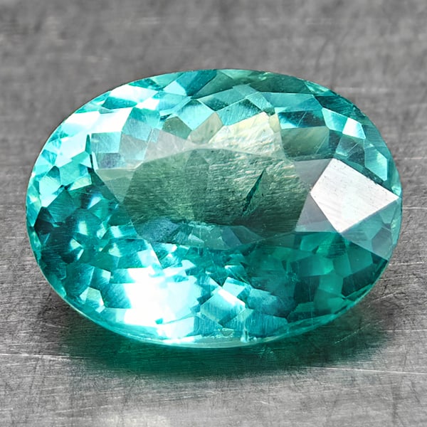 Natural Paraiba Color Neon Blue Apatite 1.01 Ct. Oval Shape 7.4 x 5.5 Mm Gemstone From Tanzania (1 of 3)