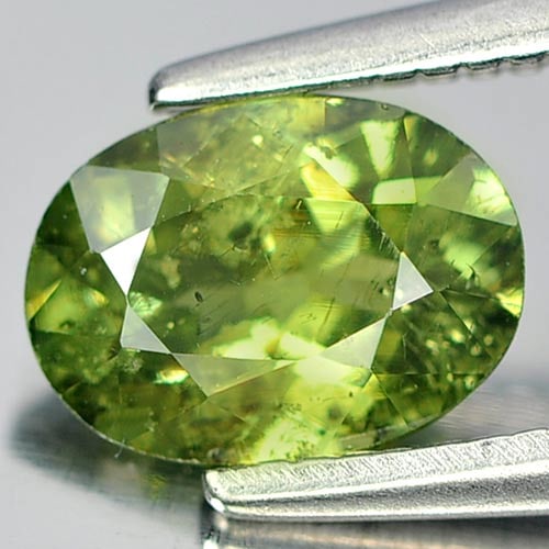 Natural Green Demantoid Garnet 0.96 Ct. Oval Shape 7 x 5.2 Mm. Gemstone Unheated From Madagascar: Product ID: 802915837 Product Name: Natural Demantoid Weight: 0.96 CT. Size: 7 x 5.2 x 3.3 MM. Shape: Oval Color: Green Clarity:SI Luster: Good Gems Origin: Madagascar , Africa Treatment: Unheated Cry