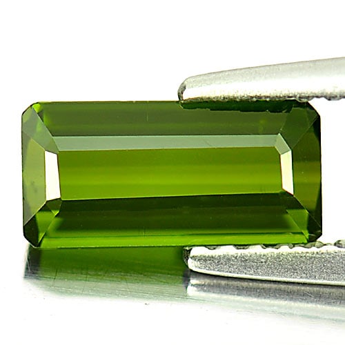 Natural Green Tourmaline 1.13 Ct. Octagon Shape 8.7 x 4.3 Mm Gemstone From Nigeria: Product ID: 807245300 Product Name: Natural Tourmaline Weight: 1.13 CT. Size: 8.7 x 4.3 x 3 MM. Shape: Octagon Color: Green Clarity:VSI Luster: Good Gems Origin: Nigeria Treatment: Unheated Crystal St
