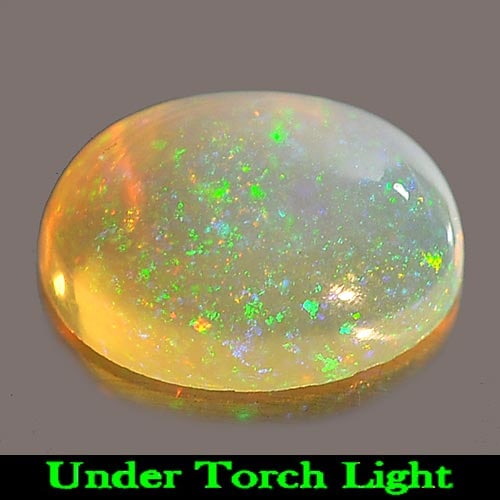 Natural Multi Color Play Of Colour Opal 1.31 Ct. Oval Cabochon Shape 9.2 x 7 Mm Gemstone From: Product ID: 818725325 Product Name: Natural Opal Weight: 1.31 CT. Size: 9.2 x 7 x 4 MM. Shape: Oval Cabochon Color: Multi Color Clarity:Semi - Transparent Luster: Iridescent Gems Origin: Ethiopia Trea