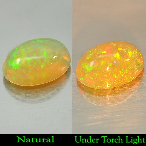 Natural Multi-Color Play Of Colour Opal 1.64 Ct. Oval Cabochon Shape 9.5 x 7.1 Mm Gemstone From: Product ID: 818707723 Product Name: Natural Opal Weight: 1.64 CT. Size: 9.5 x 7.1 x 4.8 MM. Shape: Oval Cabochon Color: Multi Color Clarity:Semi - Transparent Luster: Good Gems Origin: Ethiopia Treatm
