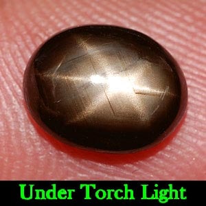 Natural Black Star Sapphire 6 Rays 2.79 Ct. Oval Cabochon Shape 8.9 x 7.3 Mm. Gemstone: Product ID: 806137543 Product Name: Natural Star Sapphire Weight: 2.79 CT. Size: 8.9 x 7.3 x 4.1 MM. Shape: Oval Cabochon Color: Black Clarity:Opaque Luster: Good 6 Rays Star Gems Origin: Thailand Tre