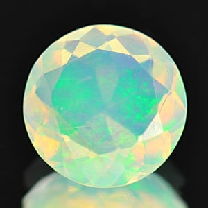 Natural Multi Color Opal 1.03 Ct. Round Shape 8.2 Mm. Gemstone From Ethiopia: Product ID: 818718118 Product Name: Natural Opal Weight: 1.03 CT. Size: 8.2 x 8.2 x 4.3 MM. Shape: Round Color: Multi Color Clarity:Semi - Transparent Luster: Good Gems Origin: Ethiopia Treatment: Unh