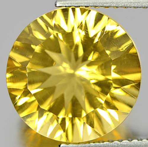 Natural Yellow Citrine 6.50 Ct. VVS Round Concave Cut 12 Mm. Gemstone From Brazil: Product ID: 801812539 / Product Name: Natural Citrine / Weight: 6.50 CT. / Size: 12 x 8 MM. / Shape: Round Concave Cut / Color: Yellow / Clarity:VVS / Luster: Very Good / Gems Origin: Brazil / Treatme