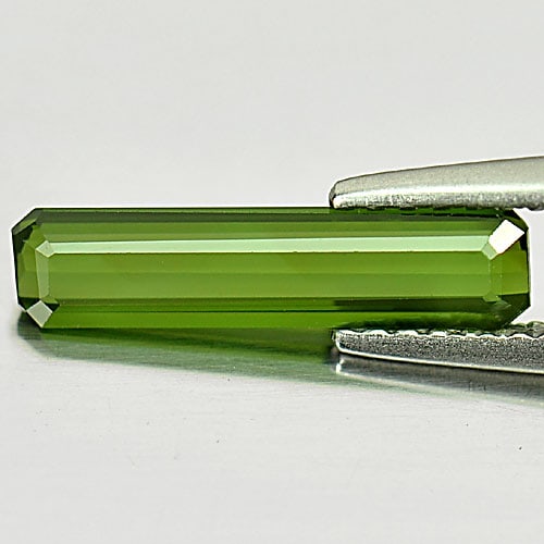 Natural Green Tourmaline 1.08 Ct. Octagon Shape 13.8 x 3.3 Mm. Gemstone Unheated From Nigeria: Product ID: 807245778 Product Name: Natural Tourmaline Weight: 1.08 CT. Size: 13.8 x 3.3 x 2.3 MM. Shape: Octagon Color: Green Clarity:VSI Luster: Good Gems Origin: Nigeria Treatment: Unheated Crystal