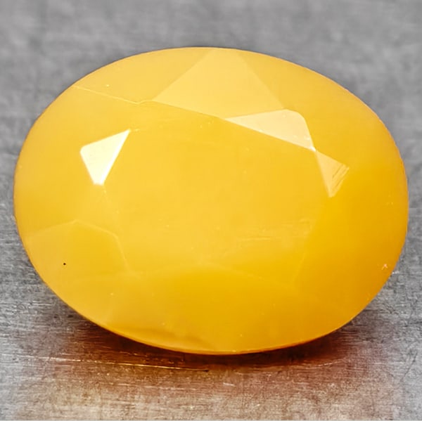 Natural Fire Opal 1.11 Ct. Oval Shape 7.8 x 6.1 Mm Gemstone from Mexico: Product ID: 118701698 Product Name: Natural Opal Weight: 1.11 CT. Size: 7.8 X 6.1 X 5.1 MM. Shape: Oval Color: Orange White Clarity:VSI Luster: Good Gems Origin: Mexico Treatment: Unheated Crystal Str