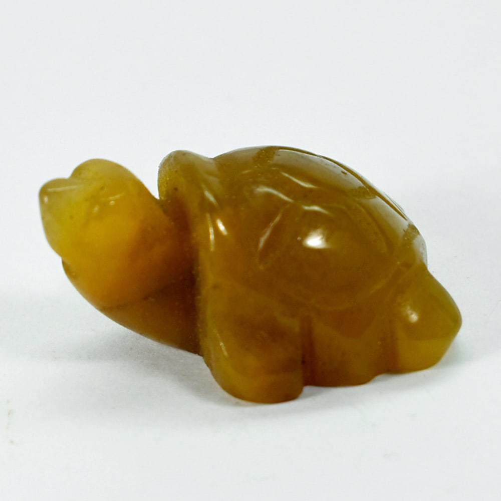 Natural Honey Jade 115.82 Ct. Turtle Carving Size 27 x 37 x 18 Mm. From Burma: Product ID: 818102420 Product Name: Natural Gemstones Weight: 115.82 CT. Size: 27 x 37 x 18 MM. Shape: Caving Color: multi Color brown Honey Clarity:Opaque Luster: Good Gems Origin: Burma Treatment: U