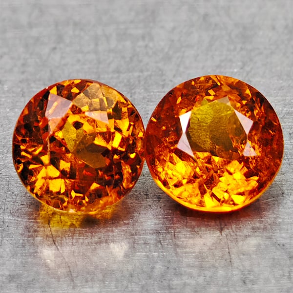 Natural Orangish Red Garnet 1.48 Ct. 2 Pcs. Round Shape 4.9 Mm Gemstones From Tanzania: Product ID: 802936480 Product Name: Natural Spessartine Weight: 1.48 CT. Size: 4.9 x 4.9 x 3.1 MM. Shape: Round Color: Orangish Red Clarity:VSI Luster: Very Good Gems Origin: Tanzania Treatment: Unhea