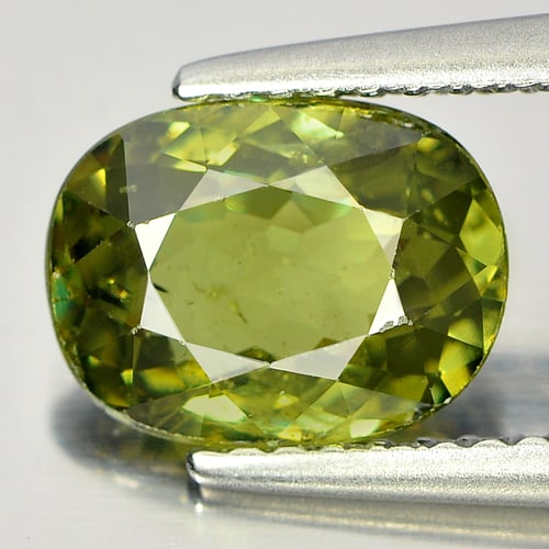 Natural Yellowish Green Demantoid Garnet 1.99 Ct. Oval Shape 8.89 x 6.74 Mm. Gemstone From: Product ID: 802922089 Product Name: Natural Demantoid Weight: 1.99 CT. Size: 8.89 x 6.74 x 3.58 MM. Shape: Oval Color: Yellowish Green Clarity:SI Luster: Good Gems Origin: Mardagascar Treatment: Unhea