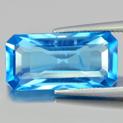 Natural Swiss Blue Topaz 8.55 Ct. Octagon Shape 17.2 x 8.6 Mm Gemstone From Brazil: Product ID: 807148474 Product Name: Natural Blue Topaz Weight: 8.55 CT. Size: 17.2 x 8.6 x 6 MM. Shape: Octagon Color: Swiss Blue Clarity:SI1 Luster: Good Gems Origin: Brazil Treatment: Treated Crysta