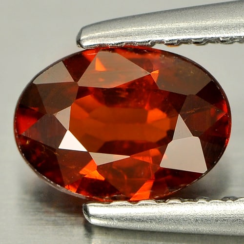 Natural Orange Red Spessartine Garnet 0.82 Ct. Oval Shape 6.8 x 4.9 Mm Gemstone From Nigeria: Product ID: 802915705 Product Name: Natural Spessartine Weight: 0.82 CT. Size: 6.8 x 4.9 x 2.7 MM. Shape: Oval Color: Orange Red Clarity:SI Luster: Good Gems Origin: Nigeria Treatment: Unheated Crysta