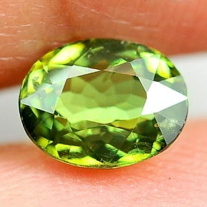 Natural Green Demantoid Garnet 1.39 Ct. Oval Shape 7.3 x 5.8 Mm Gemstone From Madagascar: Product ID: 802925925 Product Name: Natural Demantoid Weight: 1.39 CT. Size: 7.3 x 5.8 x 3.7 MM. Shape: Oval Color: Green Clarity:VSI Luster: Very Good Gems Origin: Madagascar Treatment: Unheated Crys