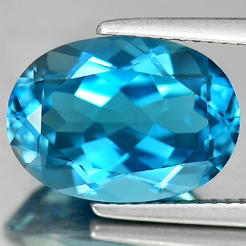 Natural London Blue Topaz 7.61 Ct. Clean Oval Shape 14 x 10 Mm. Gemstone From Brazil: Product ID: 807165551 Product Name: Natural Blue Topaz Weight: 7.61 CT. Size: 14 x 10 x 6.8 MM. Shape: Oval Color: Blue Clarity:IF Luster: Good Gems Origin: Brazil Treatment: Treated Crystal Structure