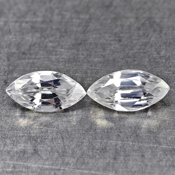 Natural White Zircon 1.84 Ct. 2 Pcs. Marquise Shape 8 Mm Gemstones From Cambodia: Product ID: 807742912 Product Name: Natural Zircon Weight: 1.84 CT. Size: 8 x 4.1 x 3.1 MM. Shape: Marquise Shape Color: White Clarity:VSI Luster: Good Gems Origin: Cambodia Treatment: Heated Crystal