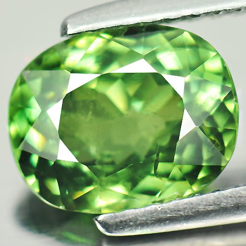 Natural Green Demantoid Garnet 2.15 Ct. Oval Shape 8.8 x 7 Mm. Gemstone Unheated From Madagascar: Product ID: 802922028 Product Name: Natural Demantoid Weight: 2.15 CT. Size: 8.8 x 7 x 4.6 MM. Shape: Oval Color: Green Clarity:SI Luster: Good Gems Origin: Mardagascar , Africa Treatment: Unheated Cr