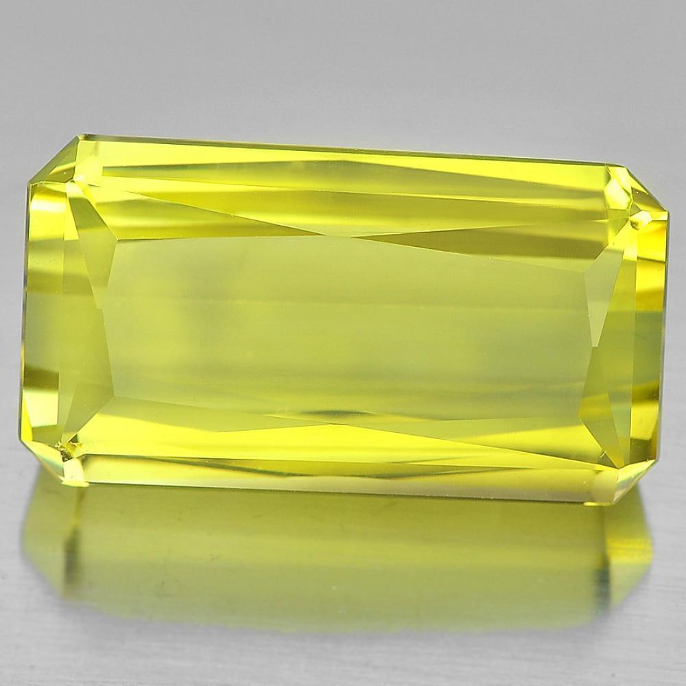 Natural Quartz Yellow Lemon 27.66 Ct. Clean Octagon Shape 22 x 12.7 Mm. Gemstone From Brazil: Product ID: 805529039 Product Name: Natural Quartz Weight: 27.66 CT. Size: 22 x 12.7 x 11 MM. Shape: Octagon Color: Yellow Clarity:IF Luster: Very Good Gems Origin: Brazil Treatment: Unheated Crystal 
