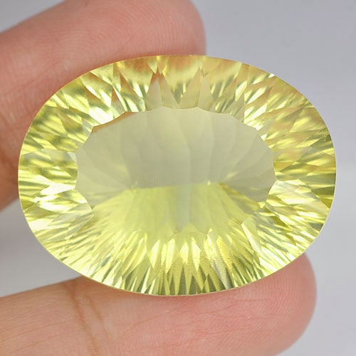 Natural Yellow Lemon Quartz 57.73 Ct. Clean Oval Concave Cut 31 x 25 Mm. Unheated Gemstone From: Product ID: 805526314 Product Name: Natural Quartz Weight: 57.73 CT. Size: 31 x 25 x 3.2 MM. Shape: Oval Concave Cut Color: Yellow Clarity:IF Luster: Very Good Gems Origin: Brazil Treatment: Unheated 