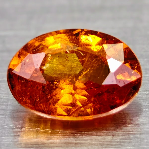 Natural Orange Fanta Spessatine Garnet 0.60 Ct. Oval Shape 5.8 x 4 Mm Gemstone From Madagascar: Product ID: 102906959 Product Name: Natural Weight: 0.60 CT. Size: 5.8 x 4 x 2.7 MM. Shape: Oval Color: Fanta Clarity:VSI Luster: Good Gems Origin: Madagascar Treatment: Unheated Crystal Structure: Ha