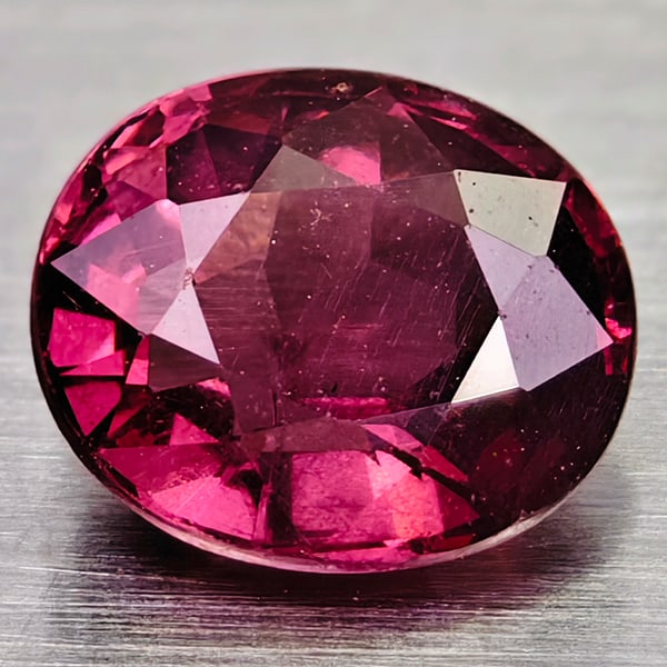 Natural Purple Pink Rhodolite Garnet 0.92 Ct. Oval Shape 6.1 x 5.2 Mm Gemstone From Madagascar: Product ID: 102906825 Product Name: Natural Rhodolite Weight: 0.92 CT. Size: 6.1 X 5.2 X 3.2 MM. Shape: OVAL Color: PURPLE PINK Clarity:VSI-SI Luster: GOOD Gems Origin: MADAGASCAR Treatment: UNHEATED 