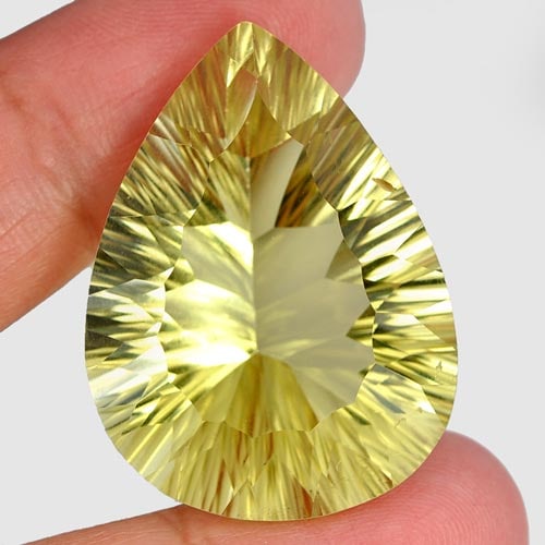 Natural Yellow Lemon Quartz 52.87 Ct. Clean Pear Concave Cut 33 x 26 Mm. Gemstone Unheated: Product ID: 805526315 / Product Name: Natural Quartz / Weight: 52.87 CT. / Size: 33 x 26 x 14.1 MM. / Shape: Pear Concave Cut / Color: Yellow Lemon / Clarity:IF / Luster: Good / Gems Origin: Brazil / 