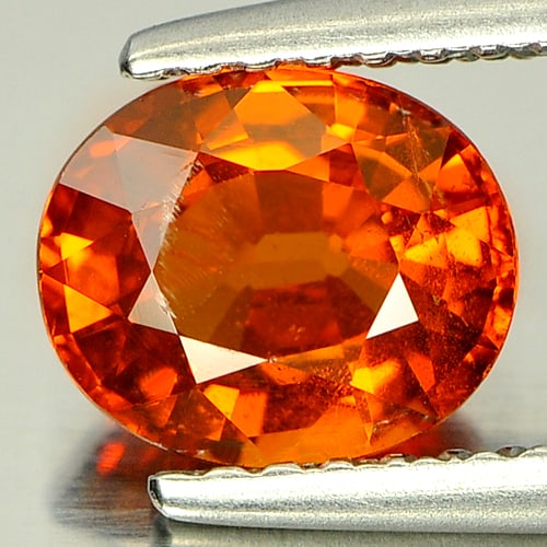 Natural Orange Spessartine Garnet 1.43 Ct. Oval Shape 7.1 x 6 Mm. Gemstone From Nigeria: Product ID: 802922946 Product Name: Natural Spessartine Weight: 1.43 CT. Size: 7.1 x 6 x 3.7 MM. Shape: Oval Color: Orange Clarity:SI Luster: Good Gems Origin: Nigeria Treatment: Unheated Crystal Stru