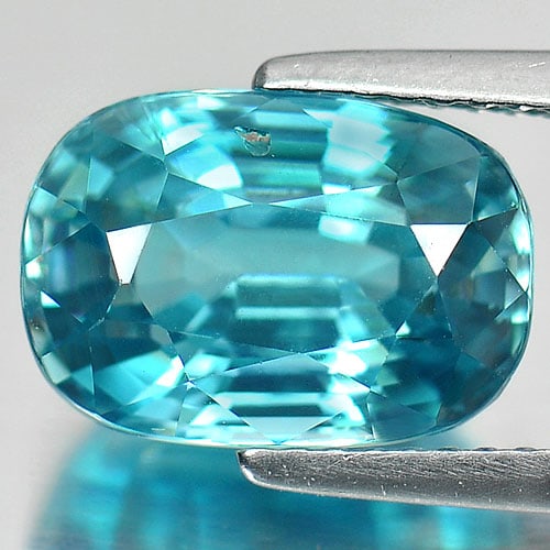 Natural Blue Zircon 6.84 Ct. Cushion Shape 11.7 x 8.1 Mm. Gemstone From Cambodia: Product ID: 807727436 Product Name: Natural Zircon Weight: 6.84 CT. Size: 11.7 x 8.1 x 6.3 MM. Shape: Cushion Color: Blue Clarity:SI Luster: Very Good Gems Origin: Cambodia Treatment: Heated Crystal S