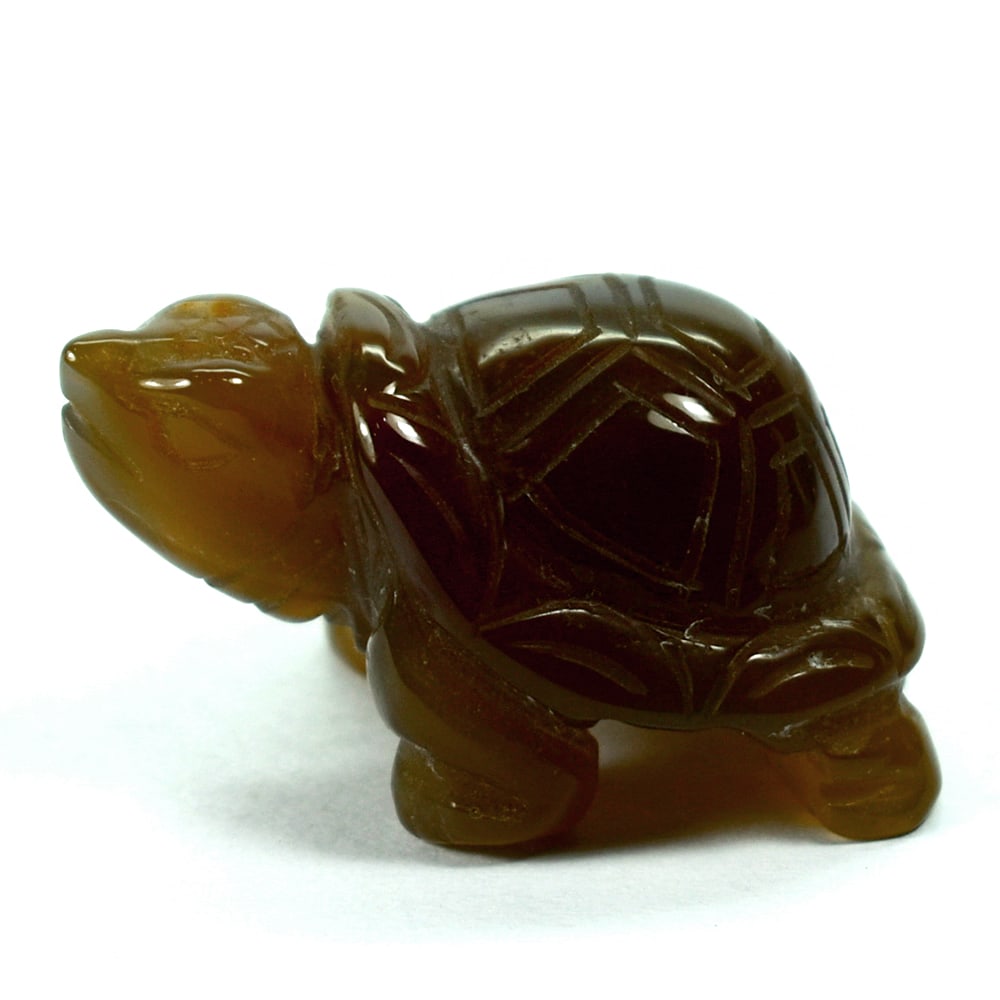 Natural Genuine Brazilian Agate 116.60 Ct. Turtle Carving Shape: Product ID: 807804886 Product Name: Natural Gemstones Weight: 116.60 CT. Size: 26 x 40 x 22 MM. Shape: Caving Color: multi Color brown Honey Clarity:Opaque Luster: None Gems Origin: Brazil Treatment: