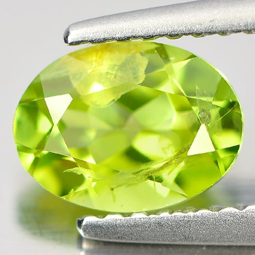 Natural Green Peridot 1.21 Ct. Oval Shape 7.8 x 5.8 Mm. Gemstone From Pakistan: Product ID: 805315921 Product Name: Natural Peridot Weight: 1.21 CT. Size: 7.8 x 5.8 x 3.8 MM. Shape: Oval Color: Green Clarity:VSI Luster: Good Gems Origin: Pakistan Treatment: Unheated Crystal Struc