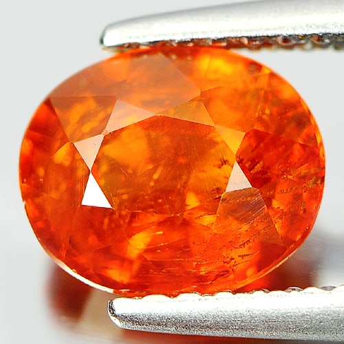 Natural Orange Spessartine Garnet 1.80 Ct. Oval Shape 7.5 x 6.3 Mm. Gemstone From Nigeria: Product ID: 802916075 Product Name: Natural Spessartine Weight: 1.80 CT. Size: 7.5 x 6.3 x 4.1 MM. Shape: Oval Color: Orange Clarity:SI Luster: Good Gems Origin: Nigeria Treatment: Unheated Crystal St